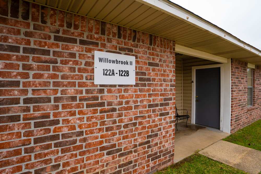 Entrance shot with signage board of apartment at Willowbrook II in Lafayette, Louisiana