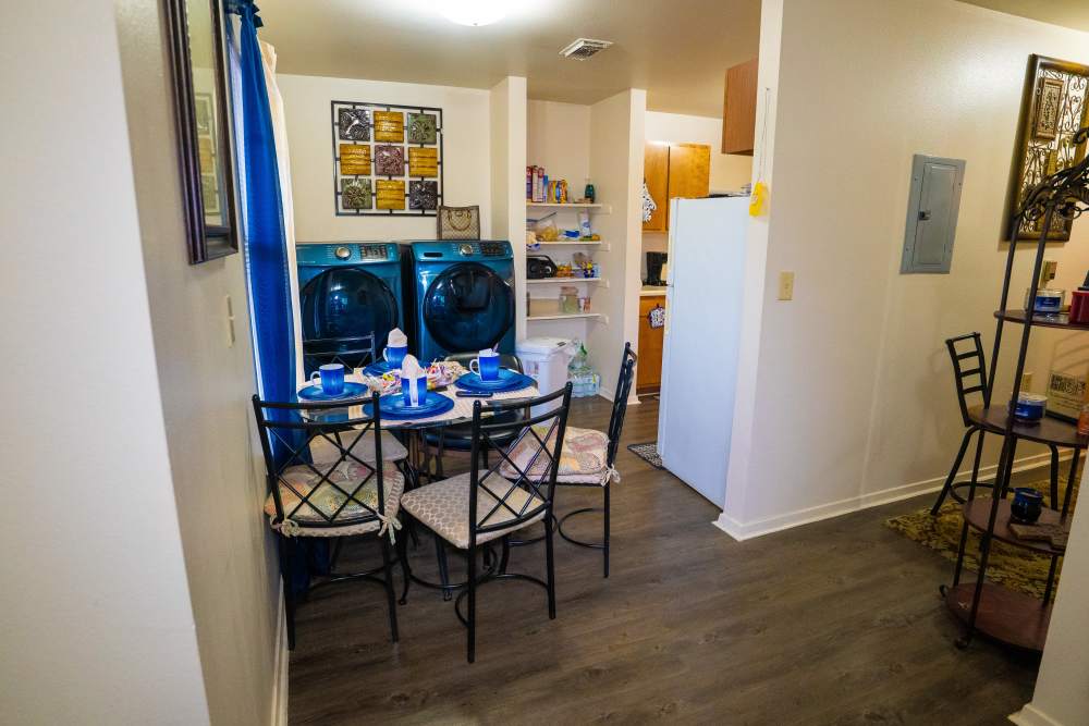 Dining space of modern apartment beside kitchen at Willowbrook II in Lafayette, Louisiana
