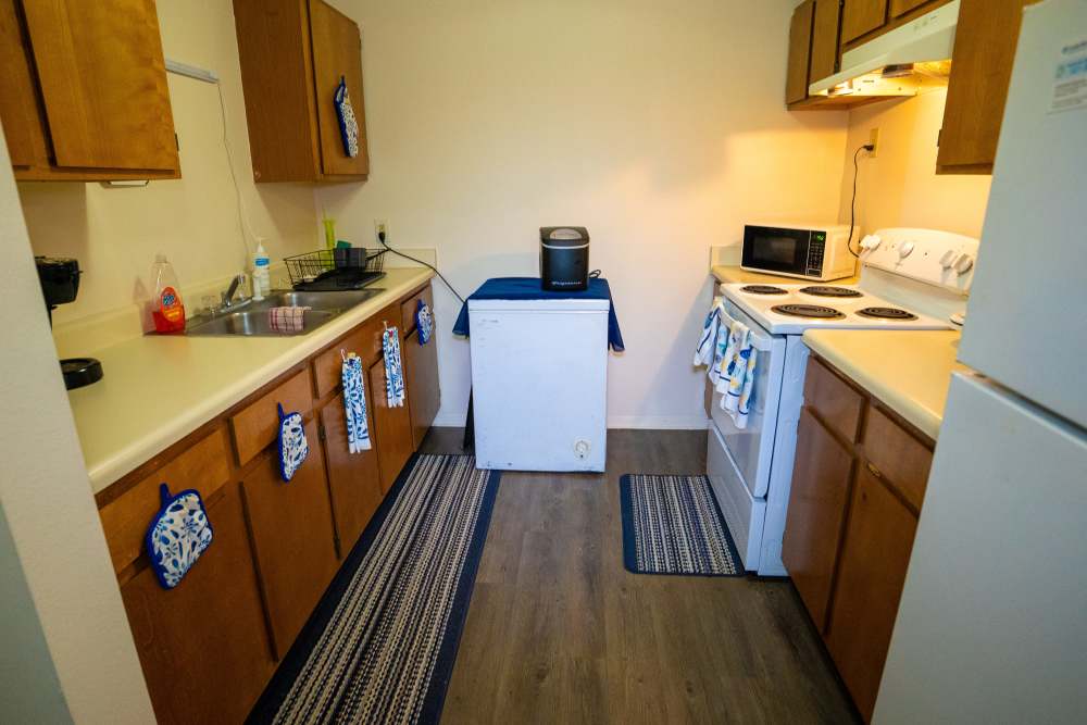 Fully equipped kitchen at Willowbrook II in Lafayette, Louisiana