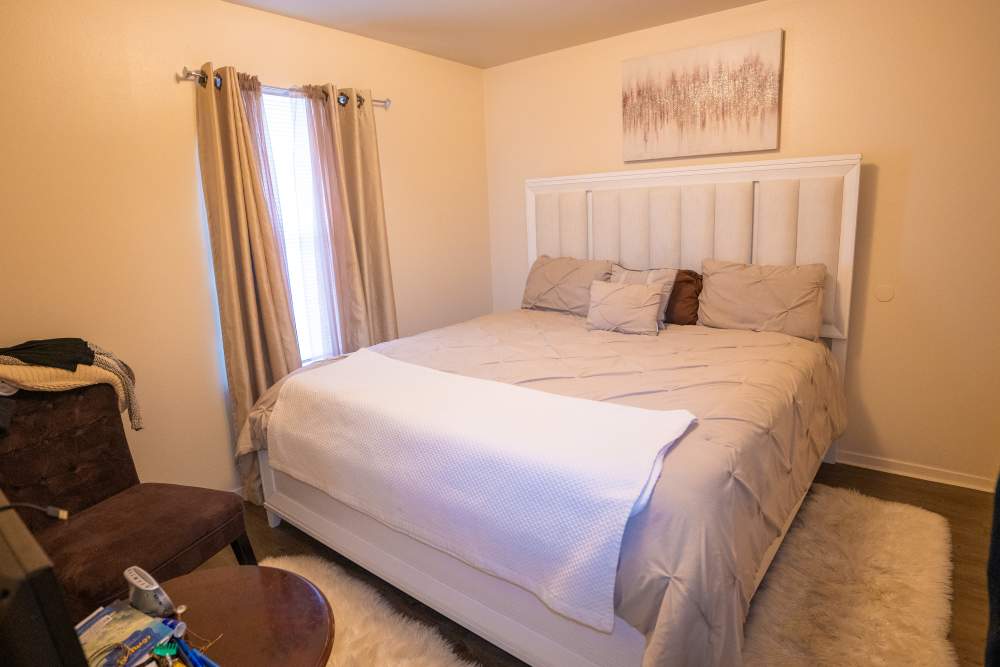 Model apartment bedroom at Willowbrook II in Lafayette, Louisiana