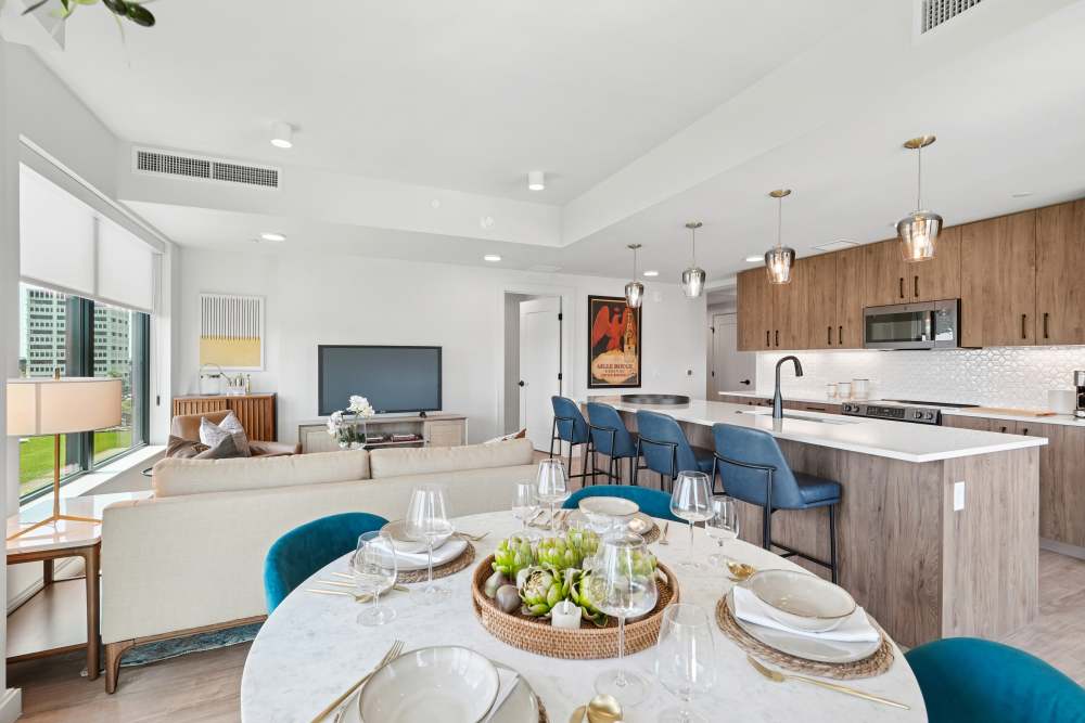 Kitchen and dinging area in a home at The Novus Apartments in Durham, North Carolina