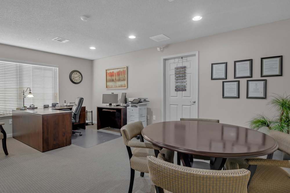 Leasing office with seating area at River Ridge in Sand Springs, Oklahoma