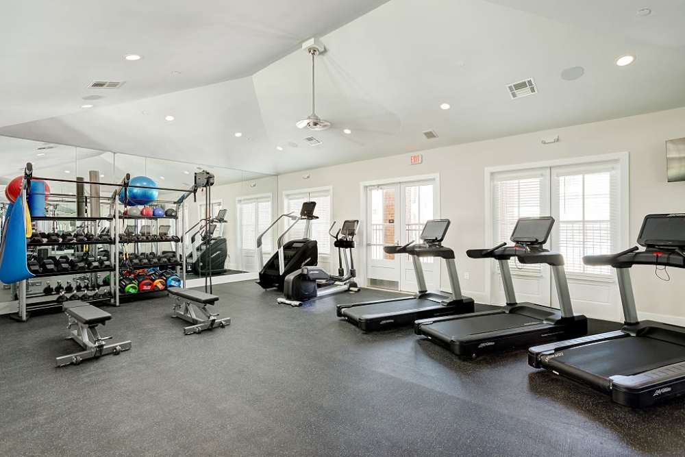 Fitness room with equipment at City Limits Apartments in Columbia, Tennessee