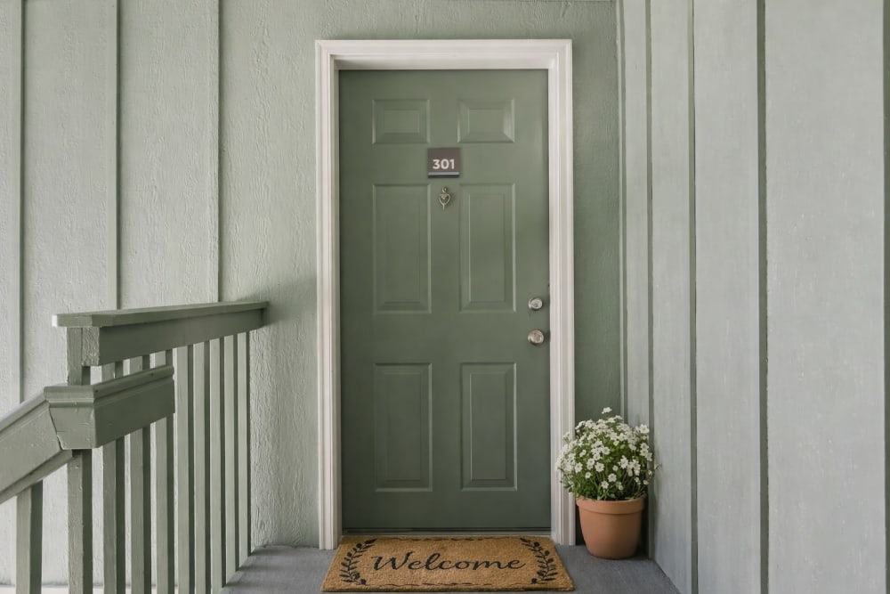 Apartment front entry with covered porch area at Briarstone in Tacoma, Washington