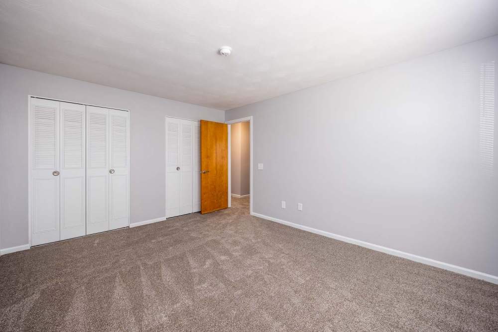 Bedroom with closet at Eastway Manor Apartments in Webster, New York