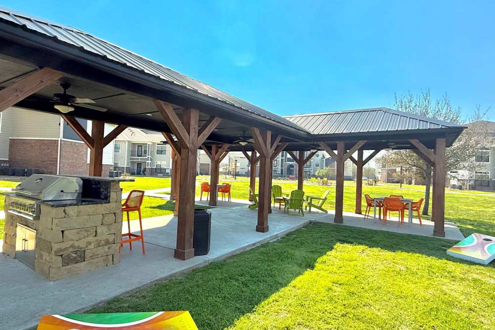 Community grilling are with green lawn at The Colony in Victoria, Texas