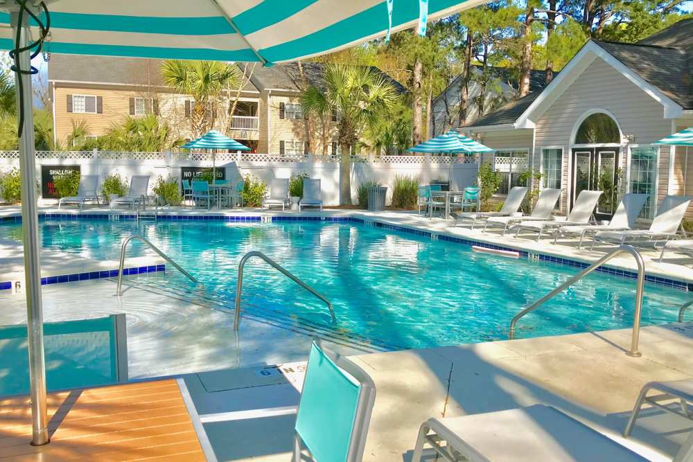 Residents cooking dinner with friends at The Lily in Charleston, South Carolina