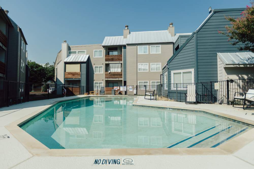 Swimming pool with community view at Hubbards Ridge in Garland, Texas