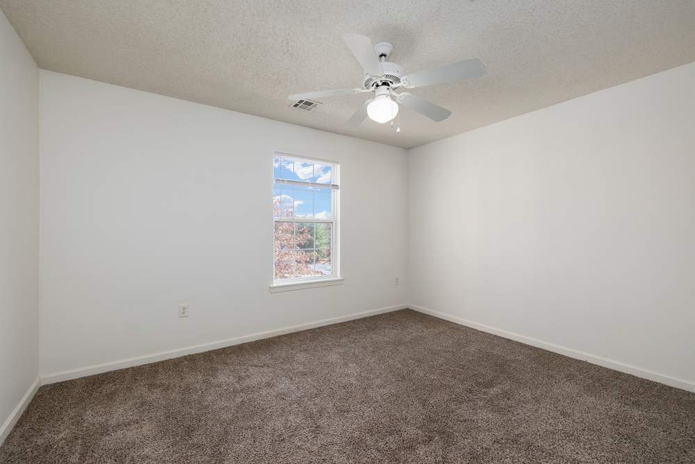 Bedroom with window at The Terraces At Copper Leaf in Nixa, Missouri