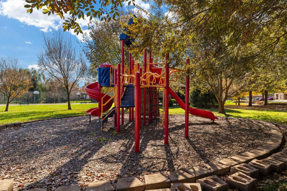 Playground with sliders at The Terraces At Copper Leaf in Nixa, Missouri