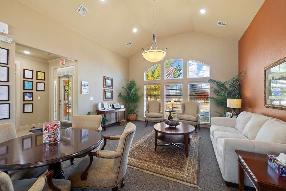 Clubhouse with sofa at The Terraces At Copper Leaf in Nixa, Missouri