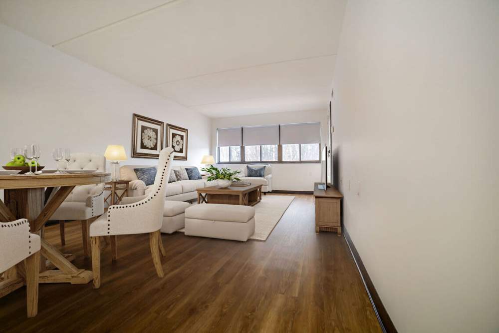 Well-lit living room at Park Garden Apartments in Methuen, Massachusetts