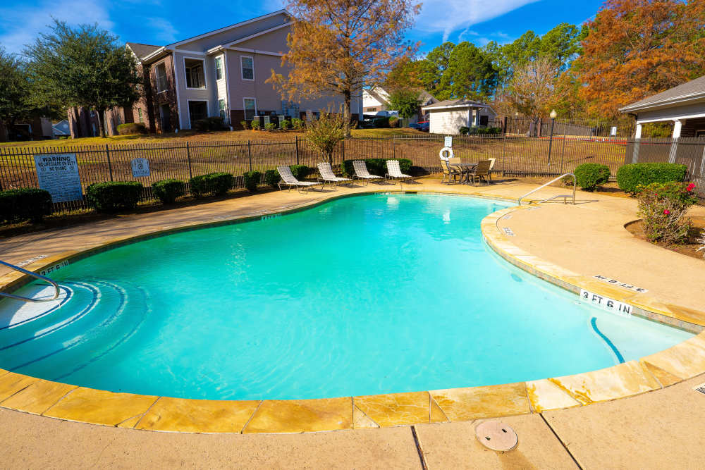 Pool with fence at Timber Village in Marshall, Texas