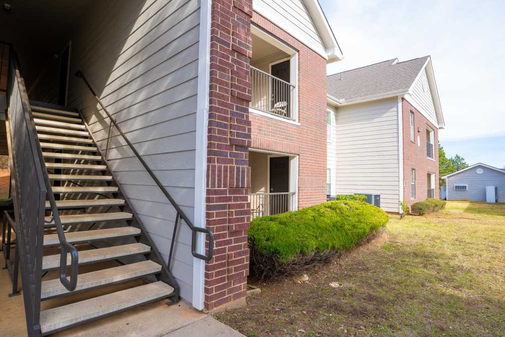 Building staircase entry at Timber Village in Marshall, Texas  