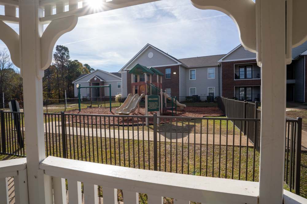 Gazebo with view to playground at Timber Village in Marshall, Texas