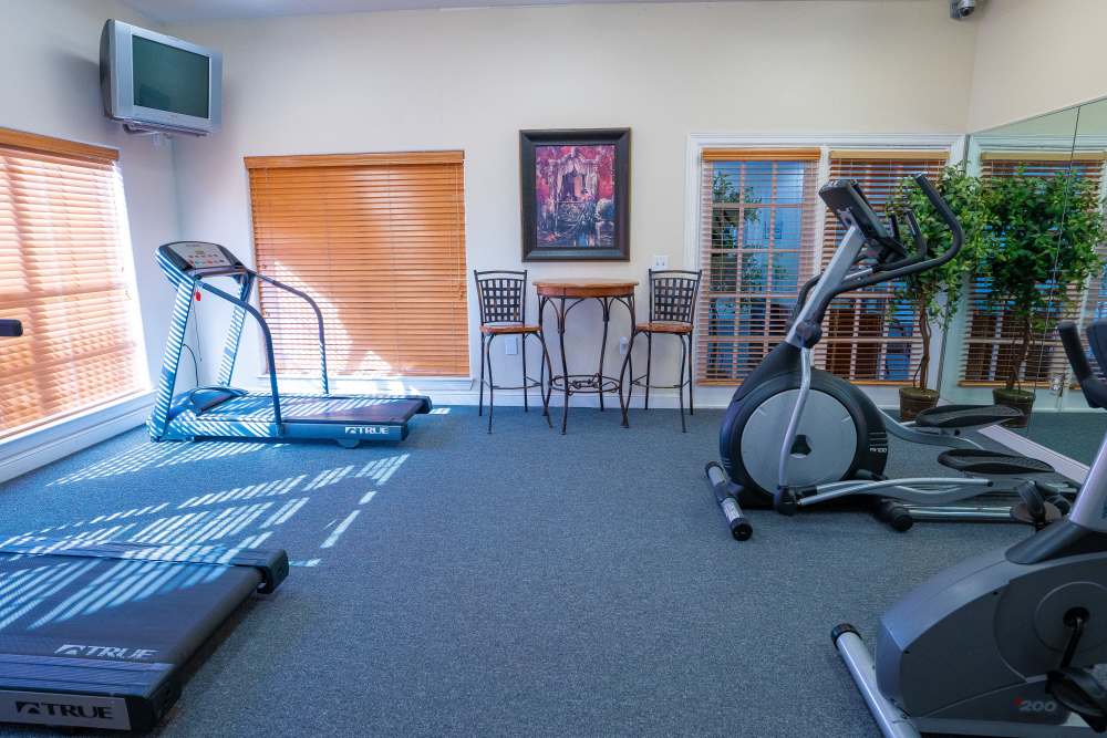Fitness center with latest gym machine at Timber Village in Marshall, Texas 