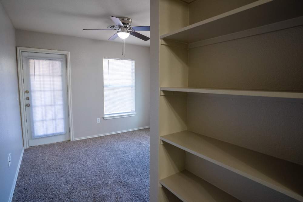 Closet rack in bedroom at Timber Village in Marshall, Texas