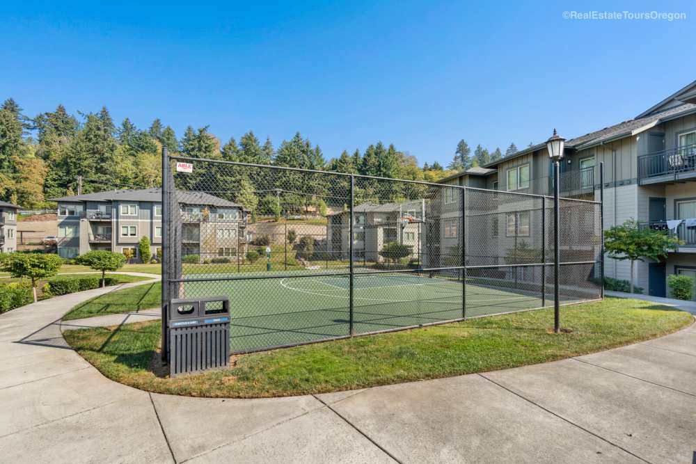 Outdoor sports court surrounded by apartment buildings at Columbia View in Vancouver, Washington
