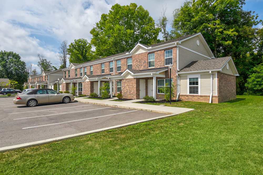 Building exterior photo with off-street parking at Woodyard Greene in Elizabeth, West Virginia