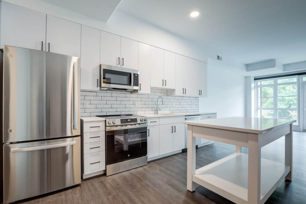 Kitchen with a tile backsplash at J Luna at Ballston in Arlington, Virginia
