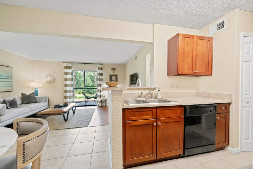 Kitchen with connecting living area at Sun Lake in Lake Mary, Florida