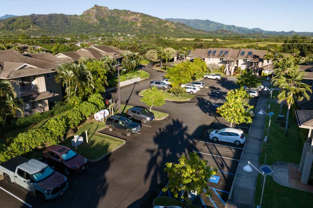 Community entry view with car parking at Nalu Waipouli in , Hawaii