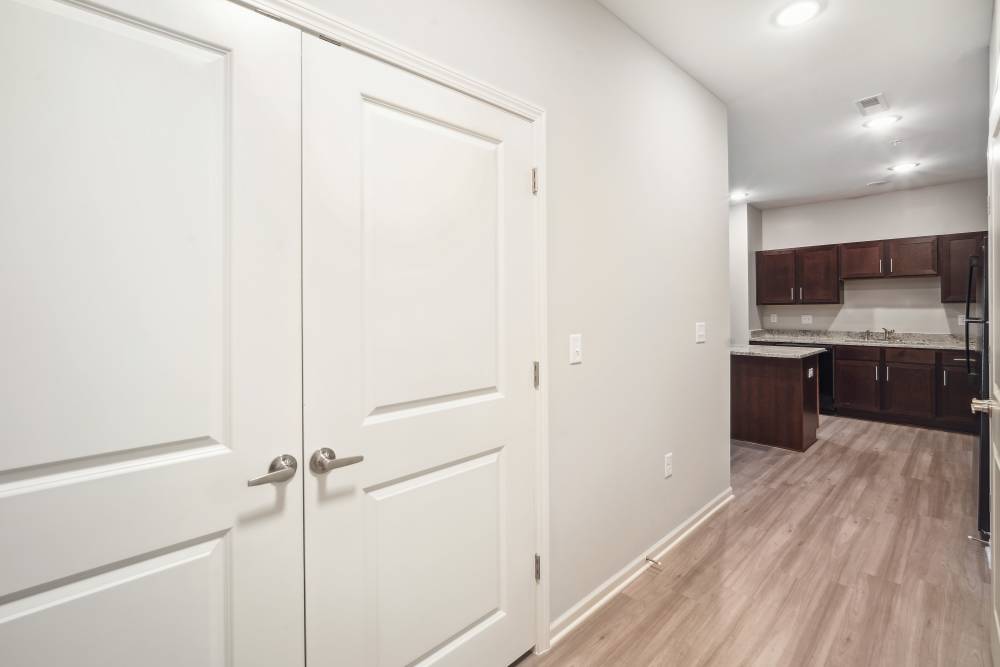 Apartment interior with connecting kitchen at The Alcove at Russell Cave in Lexington, Kentucky