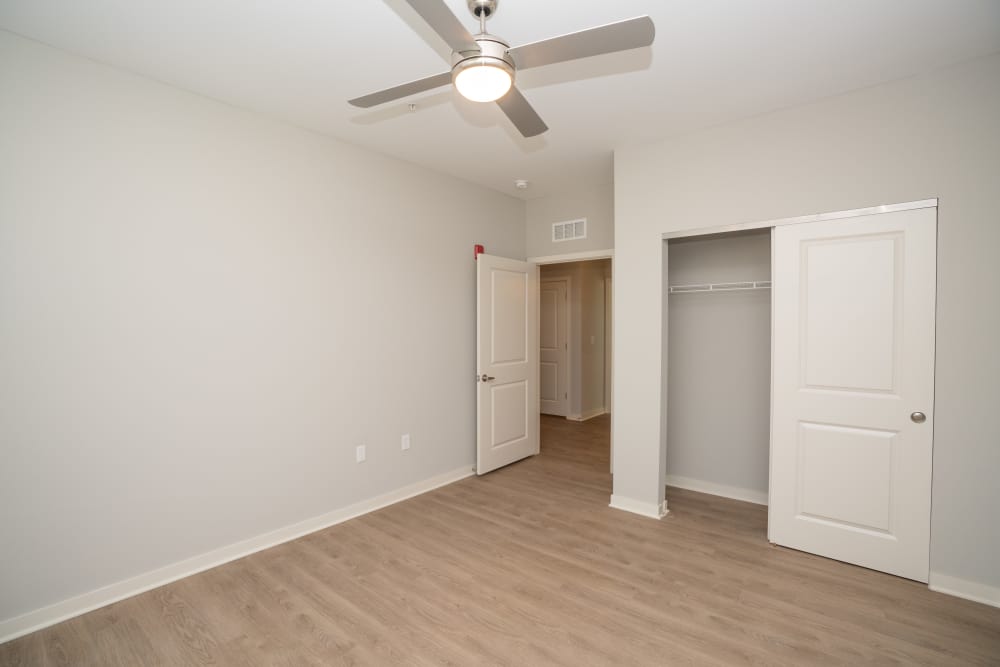 Bedroom with ceiling fan at Donerail Run in Louisville, Kentucky