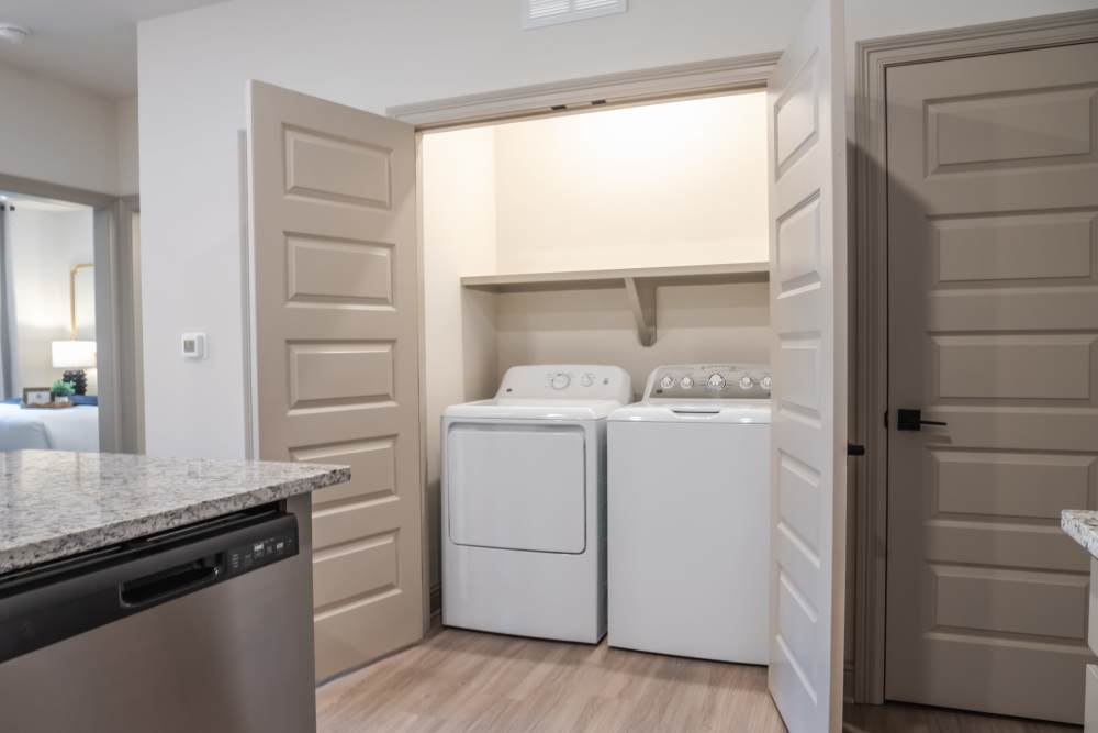 Washer and dryer in an apartment unit at The Heights at Waterpointe in Flowood, Mississippi