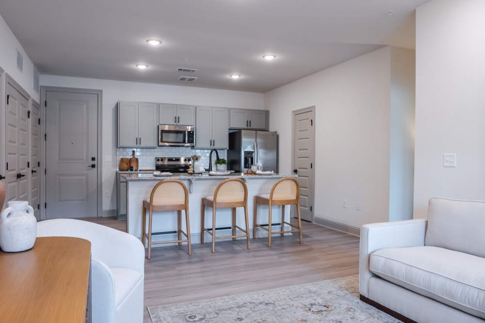 View of the kitchen from the living room at The Heights at Waterpointe in Flowood, Mississippi