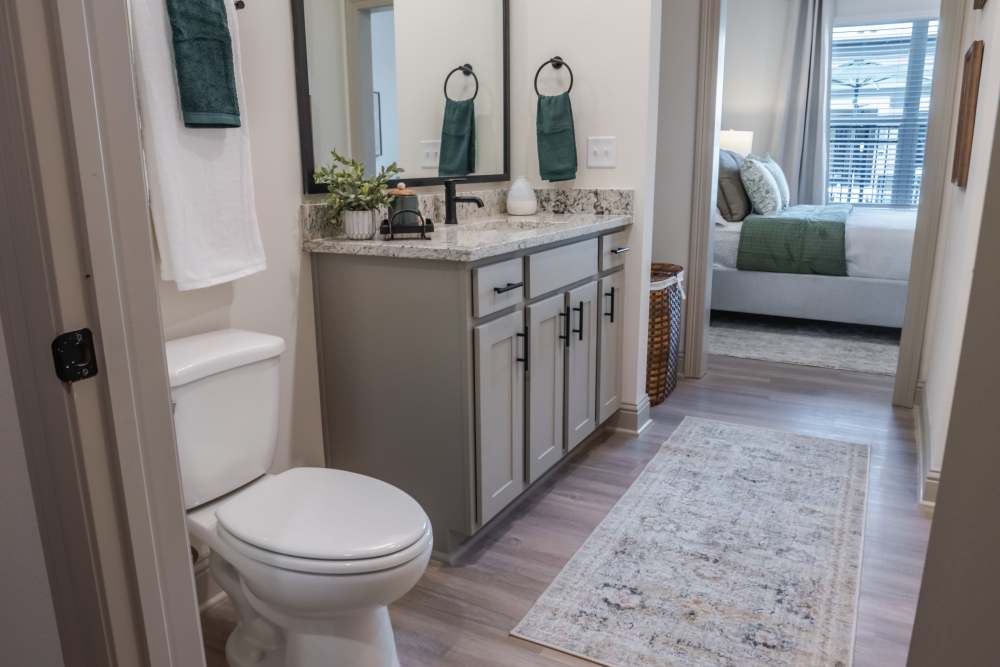 Bathroom with view of the bedroom at The Heights at Waterpointe in Flowood, Mississippi