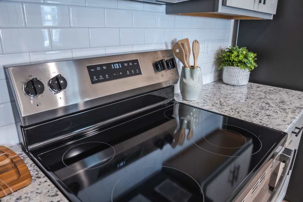 Black appliances in the kitchen at The Heights at Waterpointe in Flowood, Mississippi