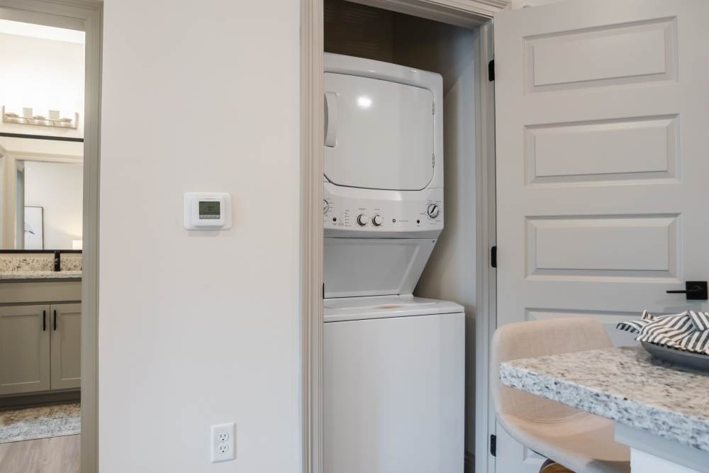 Washer and dryer inside an apartment home at The Heights at Waterpointe in Flowood, Mississippi
