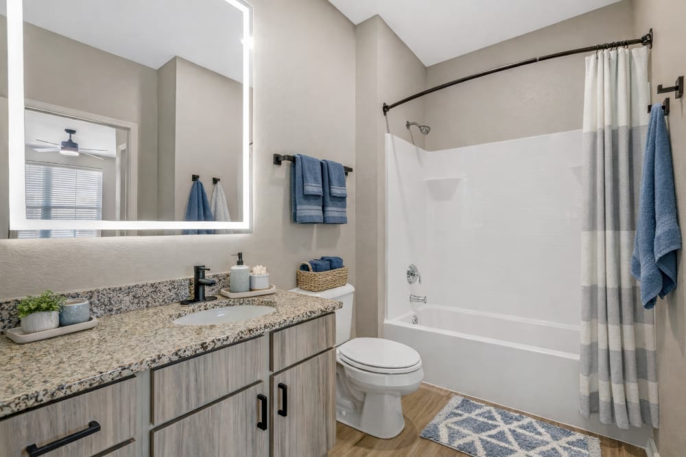 Kitchen with center island at Enclave at 127th Apartments in Plainfield, Illinois