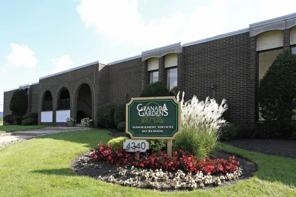 Front entrance sign of community grass at Granada Gardens Apartments in Warrensville Heights, Ohio