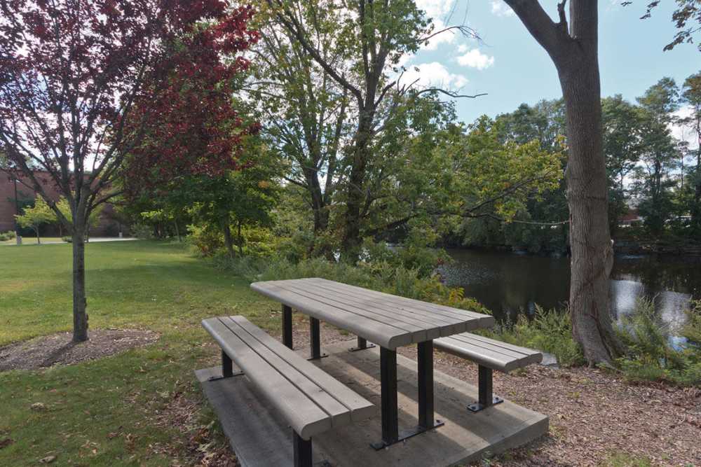Community picnic area at Robertson on the River in Taunton, Massachusetts