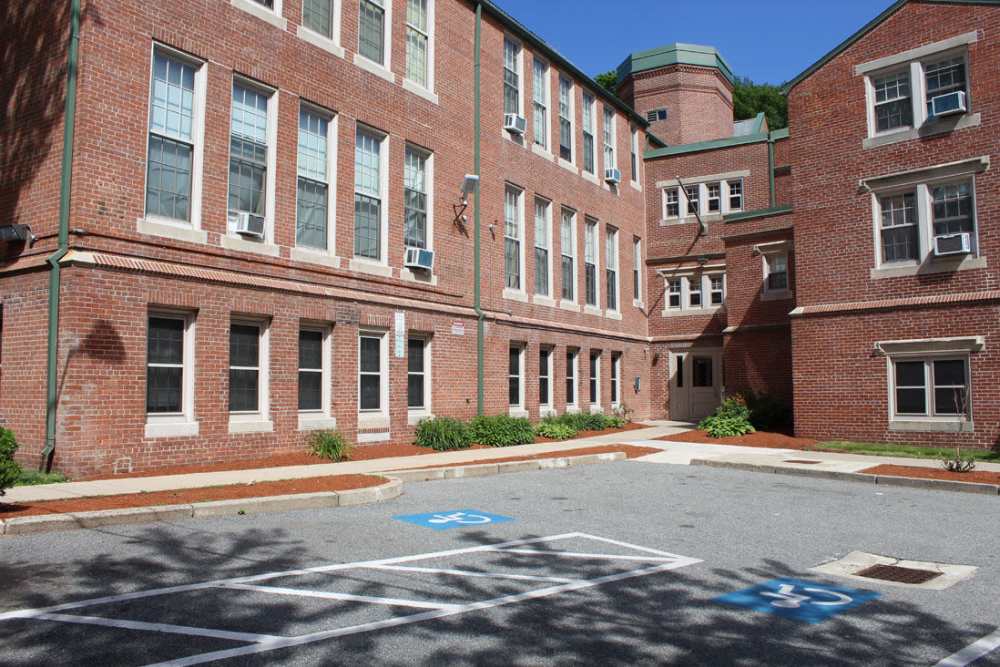 Building exterior at School House Brookledge Cummins in Mattapan,Massachusetts