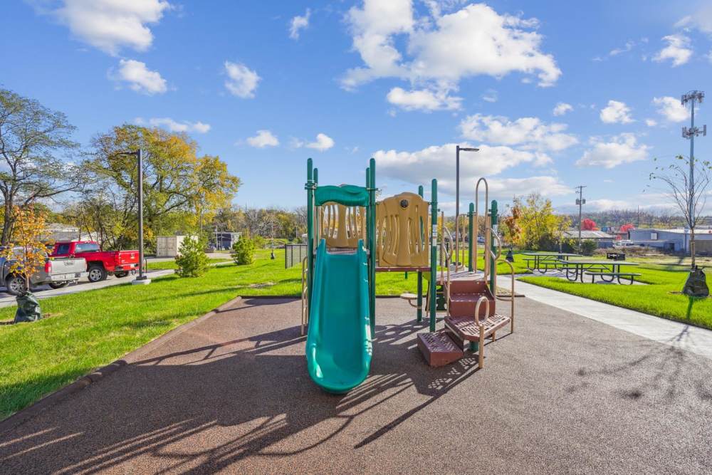 Playground with slides and climbing structures at Alley Landing in Des Moines, Iowa