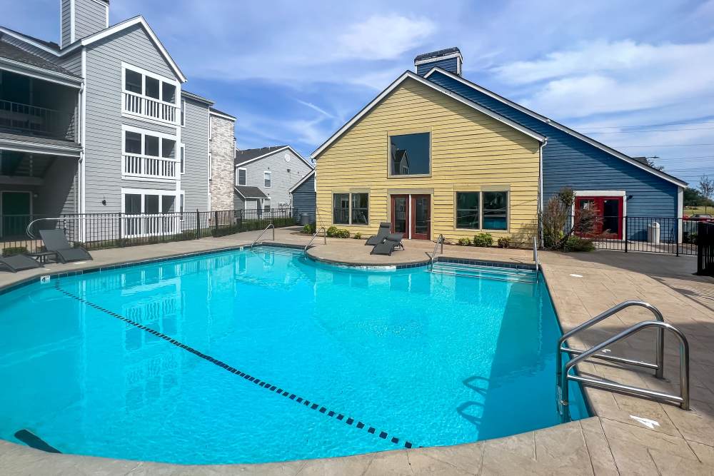 Pool with view to clubhouse at Savannah Square & Savannah Harbor in Norman, Oklahoma