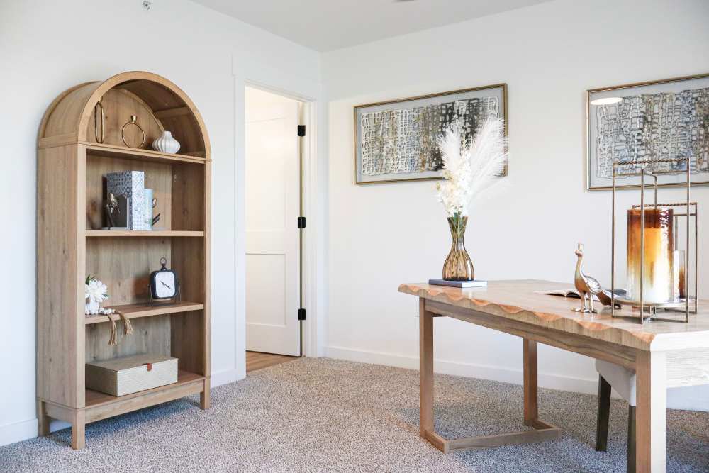 Stylish living room with modern decor at Copper Trail Townhomes in Owasso, Oklahoma