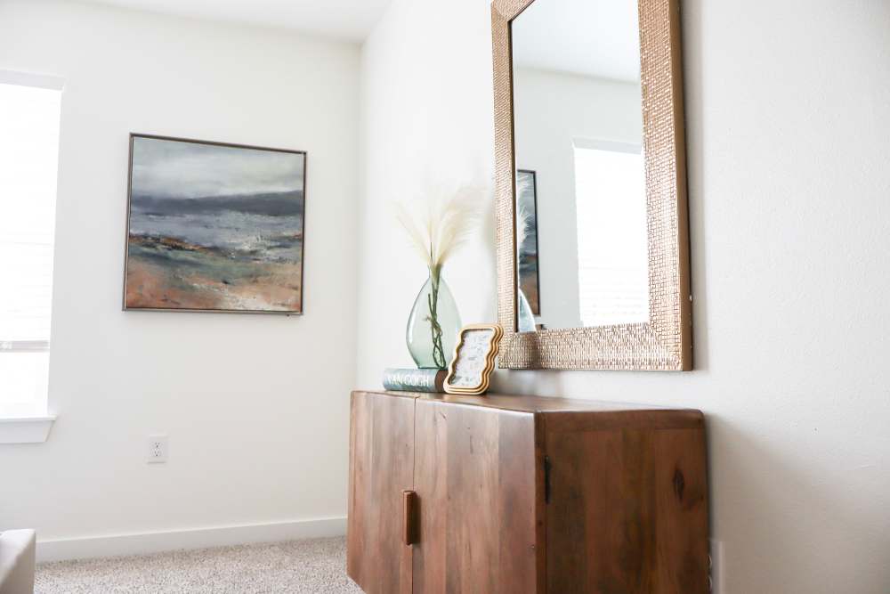 Modern living room with stylish decor at Copper Trail Townhomes in Owasso, Oklahoma