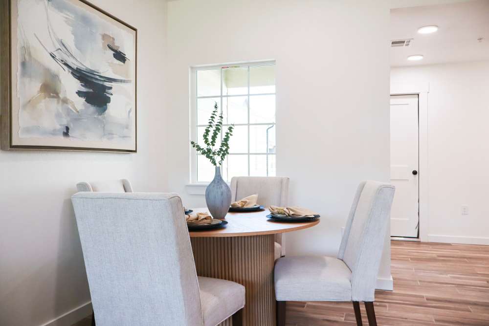 Bright dining area with modern decor at Copper Trail Townhomes in Owasso, Oklahoma