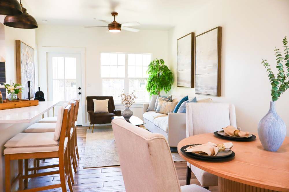 Bright open layout with stylish furnishings at Copper Trail Townhomes in Owasso, Oklahoma