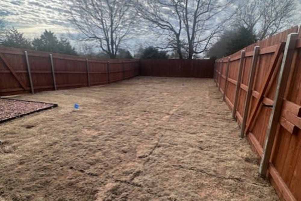Fenced yard ready for furry friends at Copper Trail Townhomes in Owasso, Oklahoma