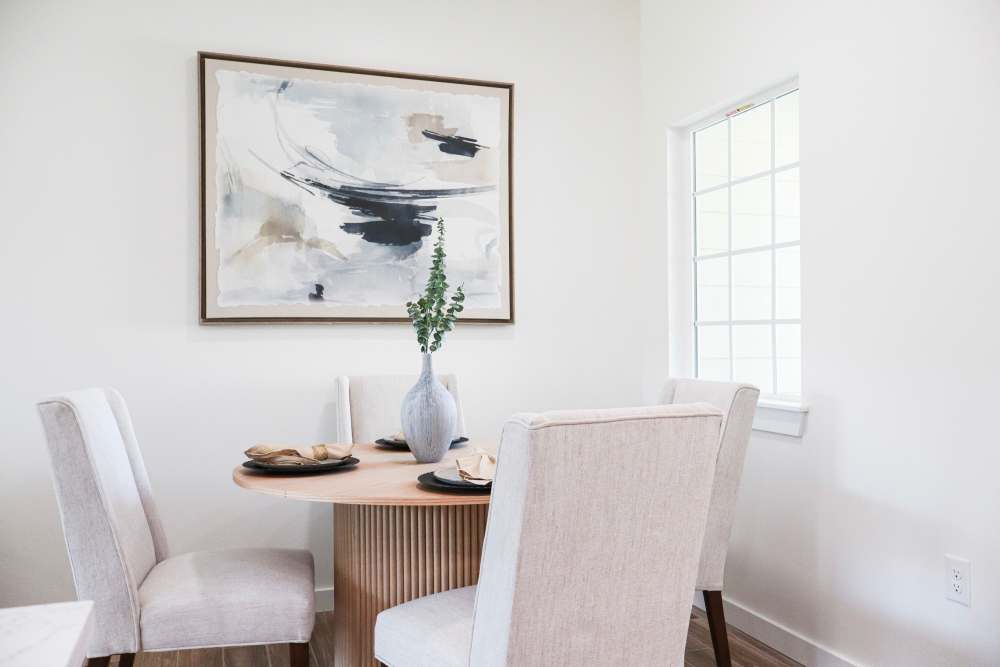 Modern dining area with stylish decor at Copper Trail Townhomes in Owasso, Oklahoma
