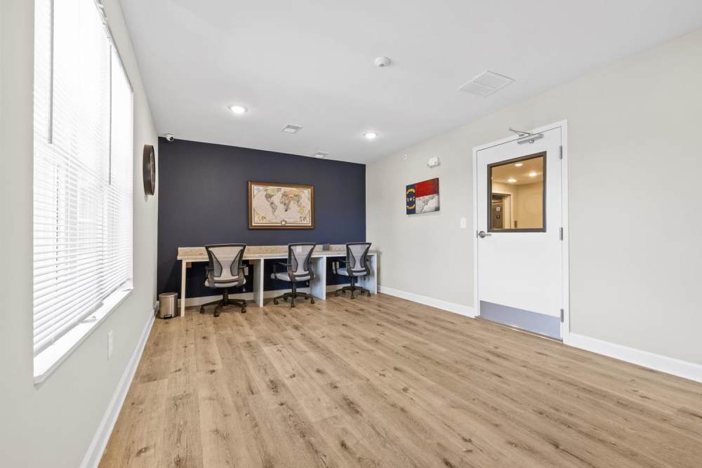Co-working space with wood-style flooring at Bluebird Commons in Statesville, North Carolina