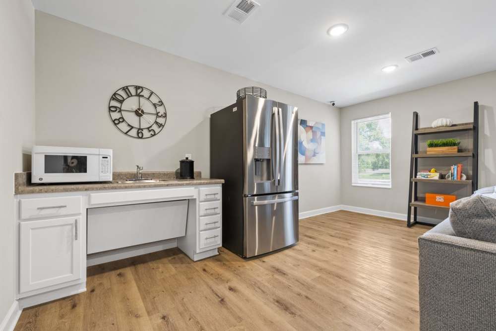 Kitchen with stainless steel appliances at Bluebird Commons in Statesville, North Carolina