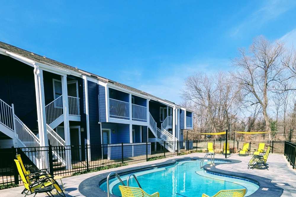 Pool with lounge chair at The Landing on 9 in Norman, Oklahoma