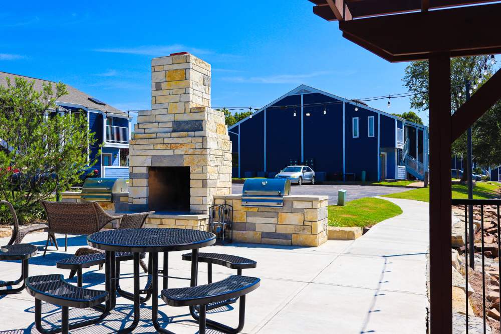 Seating area near grilling station at The Landing on 9 in Norman, Oklahoma