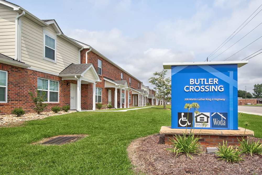 Apartment community exterior with sign at Butler Crossing at Butler Crossing I in Kingstree, South Carolina